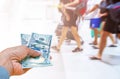 motion blurred group of travelers walking with a luggage at airport terminal, travel and adventure concept Royalty Free Stock Photo