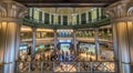 Motion blurred people conmuting and stainless steel columns at Tokyo Station Royalty Free Stock Photo