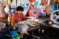 Motion blurred of people made handmade art umbrella for show traveler at Bo-sang Handicraft Center Village