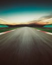 Motion blurred racetrack . Vertical or poster format .