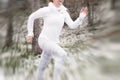 Motion blurred runner in winter