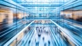 Motion Blurred View of a Modern Glass Building Interior with People Royalty Free Stock Photo