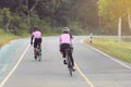 Motion blurry of Asian women Cycling during the race on road Royalty Free Stock Photo