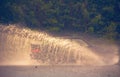 Motion car rain big puddle of water spray