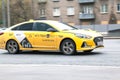 Motion city street scene with yellow taxi vehicle. Fast moving yandex taxi car on Moscow streets Royalty Free Stock Photo