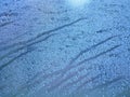 Motion drop rain on mirror window glass car in road rainy season Royalty Free Stock Photo