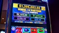 Motion of flashing wheel of fortune slot machines inside Casino
