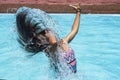 Motion freeze on a girl splashing the sea water with her hair Royalty Free Stock Photo