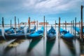 Motion of Gondolas floating in the Grand Canal withfocus on San Giorgio Maggiore church in background Royalty Free Stock Photo