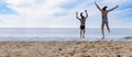 Motion movement happy two children wear swimwear running and jumping from beach to the sea. Happy family holiday summer concept. Royalty Free Stock Photo