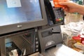 Motion of people paying credit card at check out counter