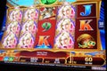 Motion of people playing slot machine inside Casino