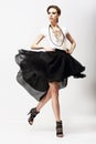 Motion. Vitality. Luxurious Supermodel in Fluttering Fashion Dress. Oscillation