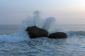 Waves against rocks at a beach in Pacitan, East Java, Indonesia Royalty Free Stock Photo