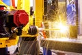 Motion Welding robots in factory with sparks, manufacturing, industry, factory Royalty Free Stock Photo