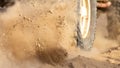 Motion the wheels tires off road dust cloud in desert, Offroad vehicle bashing through sand in the desert Royalty Free Stock Photo