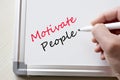 Motivate people written on whiteboard Royalty Free Stock Photo