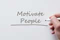 Motivate people written on whiteboard Royalty Free Stock Photo