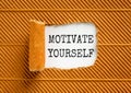 Motivate yourself symbol. Concept words Motivate yourself on beautiful white paper. Beautiful brown paper background. Business Royalty Free Stock Photo