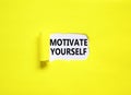 Motivate yourself symbol. Concept words Motivate yourself on beautiful white paper. Beautiful yellow paper background. Business Royalty Free Stock Photo