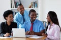 Motivated african american business team talking about strategy Royalty Free Stock Photo