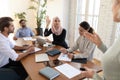 Motivated Arabic female employee participate in group discussion Royalty Free Stock Photo