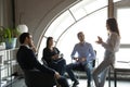 Motivated female leader head meeting with colleagues Royalty Free Stock Photo