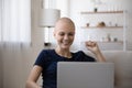 Motivated woman cancer patient encourage sick friend by video call