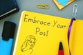 Motivation concept about Embrace Your Past with inscription on the page