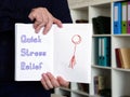 Motivation concept meaning Quick Stress Relief with sign on the sheet Royalty Free Stock Photo