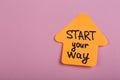 Motivation concept - orange sticky note in shape of arrow with text Start your way Royalty Free Stock Photo