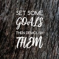 Inspirational quotes - Set some goals the demolish them. Blurry background