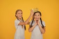 Motivation to be the best. small egoist girls imagine they are princess. success reward. happy childhood frienship Royalty Free Stock Photo