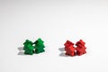 Motivation - Two teams of pawns in a huddle Royalty Free Stock Photo