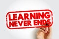 Motivational concept with LEARNING NEVER ENDS text stamp. Continuous education and growth idea for business, training, or school Royalty Free Stock Photo
