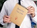 Motivational concept meaning Declutter Your Life S with sign on the piece of paper