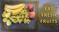 Motivational and educational sign: Eat fruit, eat healthy Royalty Free Stock Photo