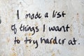 Motivational graffiti on grungy wall