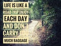 Motivational and Inspiration quote text - Life is like a road trip enjoy each day and don't carry too much baggage Royalty Free Stock Photo