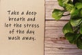 Motivational and inspirational quote on burnt edge brown paper on wooden desk Royalty Free Stock Photo