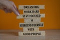 Motivational and inspirational quote - Dream big, work hard, stay focused and surround yourself with good people. Orange Royalty Free Stock Photo