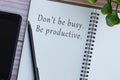 Motivational and inspirational quote on note book on wooden desk . Royalty Free Stock Photo