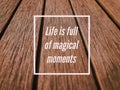 Motivational and inspirational quote with phrase LIFE IS FULL OF MAGICAL MOMENTS Royalty Free Stock Photo