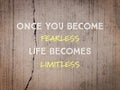 Motivational and inspirational quote with phrase ONCE YOU BECOME FEARLESS, LIFE BECOMES LIMITLESS