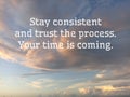 Life inspiraitonal motivational quote - Stay consistent and trust the process. Your time is coming. On sunset blue sky background.