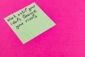 Motivational note on a bright pink background encouraging hard work Royalty Free Stock Photo