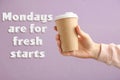 Motivational quote Mondays are for Fresh Starts and closeup view of woman with coffee on lilac background Royalty Free Stock Photo