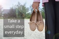 Motivational quote written with Take A Small Step Everday