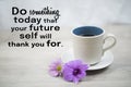 Motivational words - Do something today that your future self will thank you for. With cup of morning coffee and purple flowers. Royalty Free Stock Photo