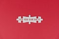 Motivational words - Yes you can do it. Positive motivation text on white puzzle jigsaw on red background.